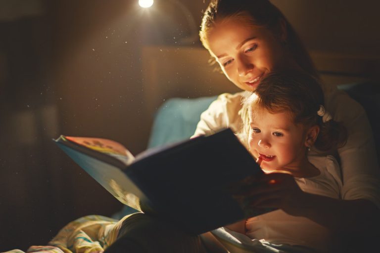 Children reading stories with parents in Miami